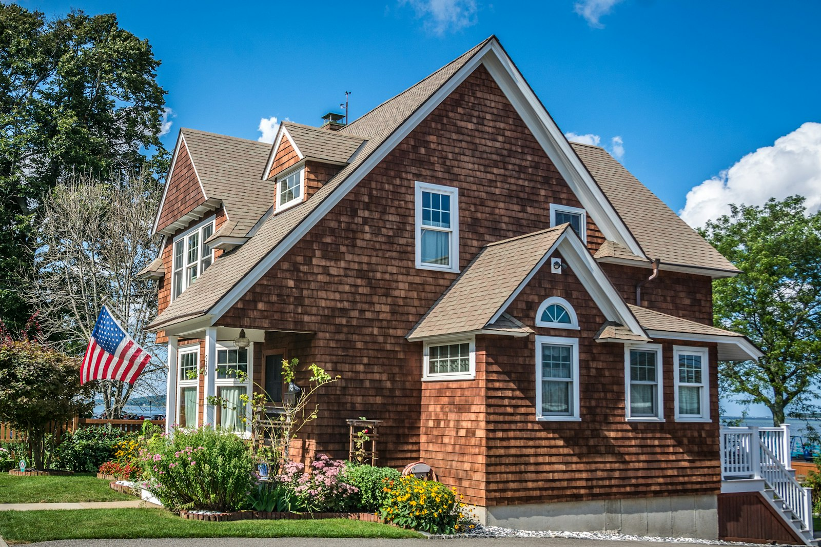 Brick home with landscaping on a residential street