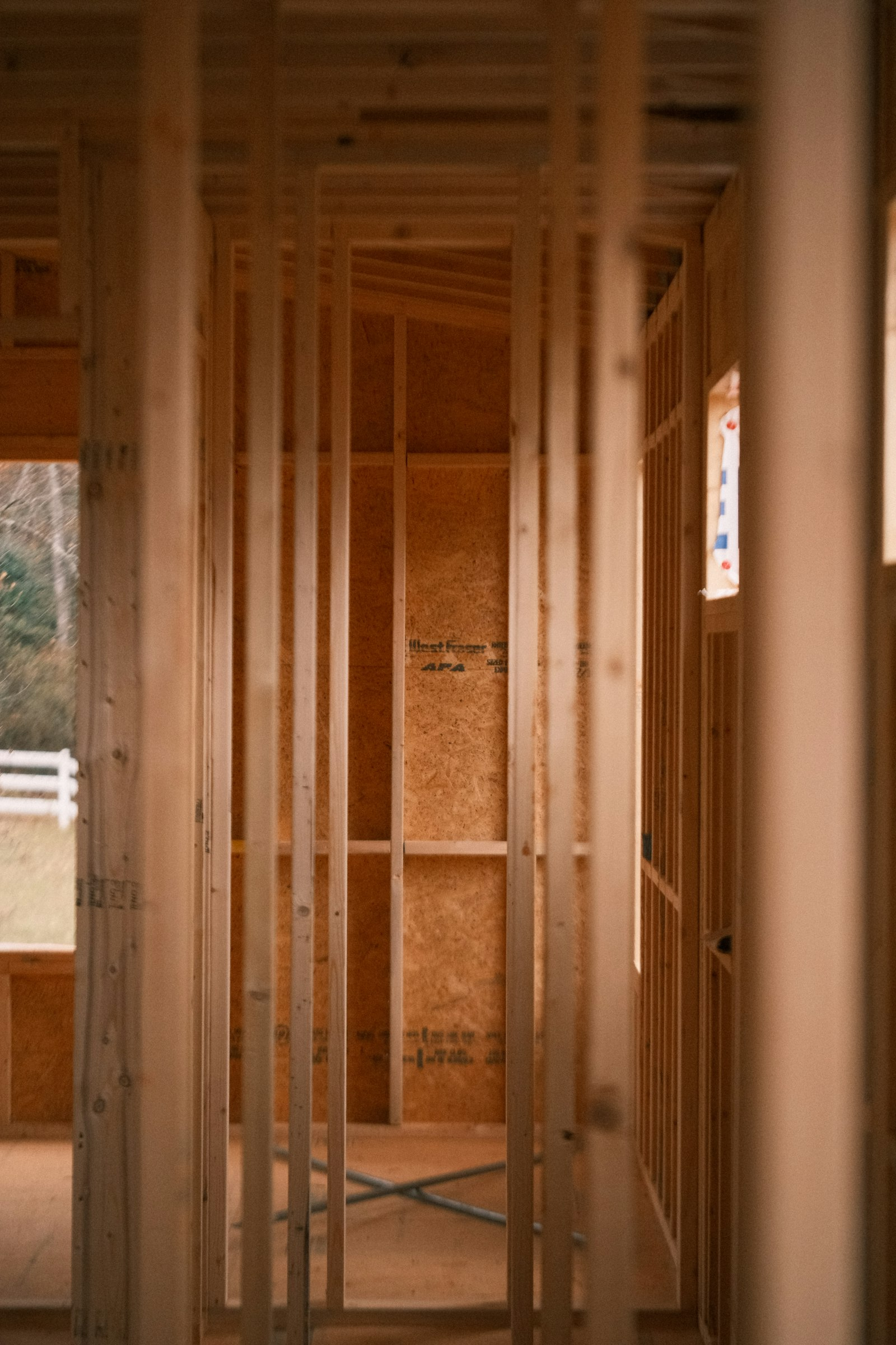 Wood framing inside a residential room addition under construction